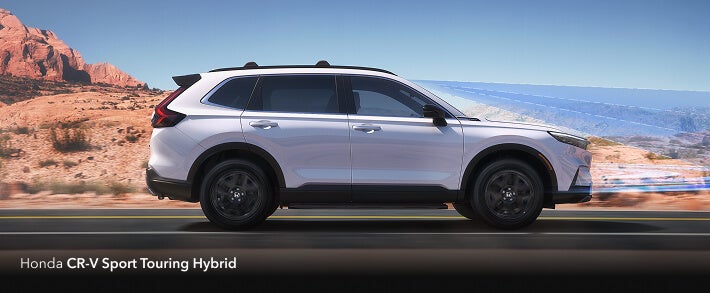 CR-V Sport Touring Hybrid on a scenic drive